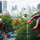 Robert Downey Jr. in his Iron Man suit and Tom Holland in his Spider-Man suit fly and swing through NYC in Spider-Man: Homecoming.